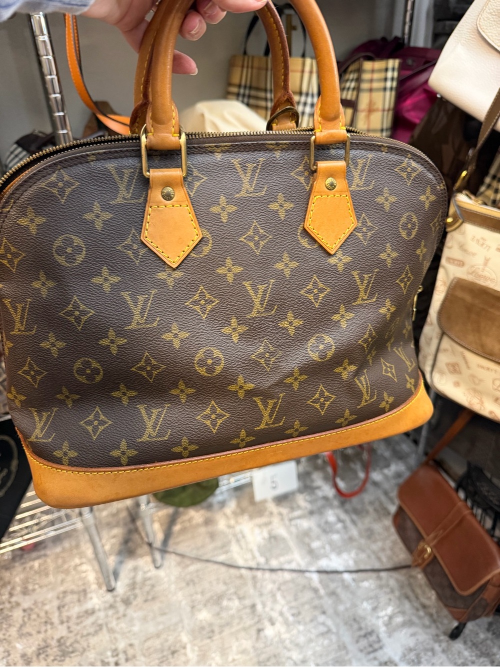 Louis Vuitton Alma Monogram Canvas Brown Satchel